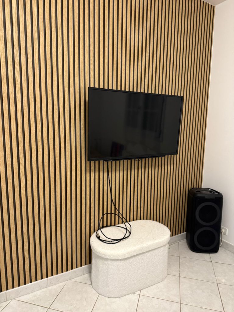 Tapisserie chambre enfants à Tours — après travaux, réalisée par Quidservices